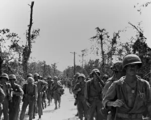 Peleliu: Marines advancing on a road toward the northern