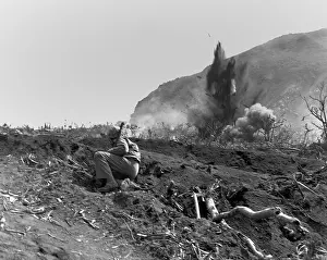 Offensives: Marines blast Jap positions near the base of Mount