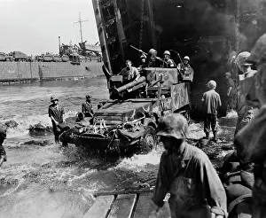 Conflicting: US Marines emerge from landing craft