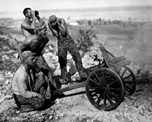 Forager: Marines fire a captured Japanese mountain gun