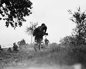 Hopping: Marines move against the Japanese on Saipan. June
