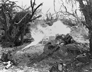 Throwers: Marines use a flame thrower against Japanese defenses