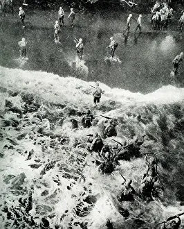 Ashore: US Marines wade ashore in Marshall Islands, WW2