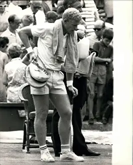 Dejected: Mark Cox after tennis match at Wimbledon