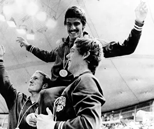 Teammates: Mark Spitz shows off his 7th Gold Medal, ?