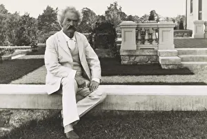 Lcgr2003: Mark Twain sitting on terrace in his preferred
