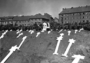 Markers: Markers are for the graves of 80 victims of the