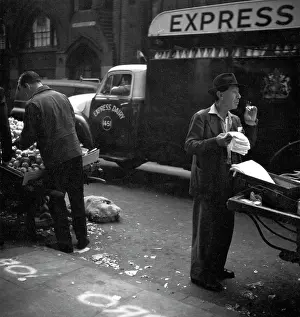 Arranges: Market scene in Central London