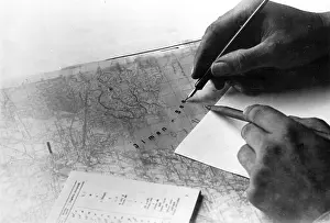 Designations: Marking a map in a map office on the Eastern Front, 1941