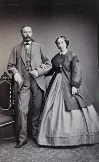 Married couple. He with a long mustache and