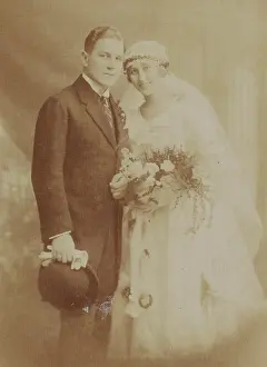 Spouses: Married couple in wedding dresses