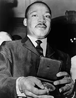 Sclc: Martin Luther King showing a medallion from ?