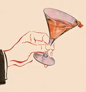 Garnished: Martini Glass in Hand