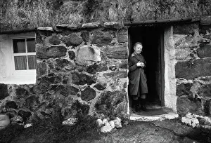 Crofter: Mary MacDonald outside her crofter's cottage, Outer Hebrides