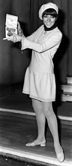 Quant: Mary Quant holding her Order of the British Empire medal