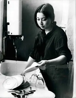Smash: Masae Hayashi, black belt in karate, washing dishes, London