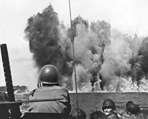 Lcgr1311: A massive wall rises from the water of Peleliu