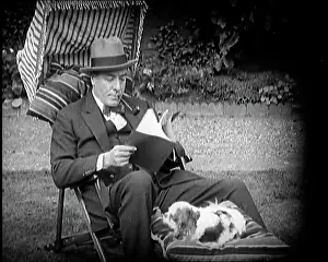 Matheson: Matheson Lang Relaxing in a Deck Chair Smoking