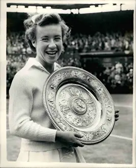 Retains: Maureen Connolly wins tennis final at Wimbledon