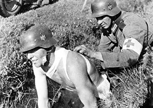 Bandages: Medic helps a wounded man