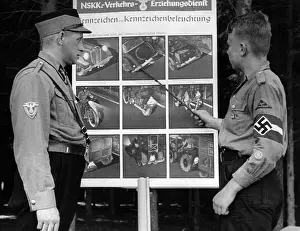 Hear: A member of the Motor HJ at a traffic training, 1938