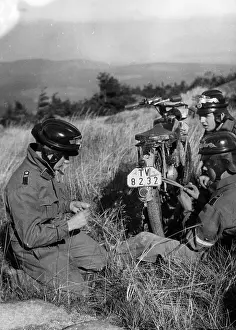 Tire: Members of the Motor HJ have a flat tire, 1940