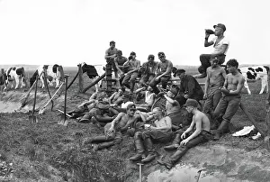 Drainage: Members of the National Labor Service during a break, 1934