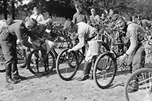 Bicyle: Members of the RAD clean their bicycles, 1937