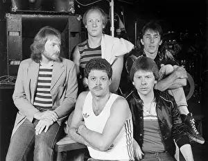 Teeshirt: Members of a rock group