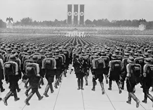 Right Wing: Members of the SS marching in formation on Nazi