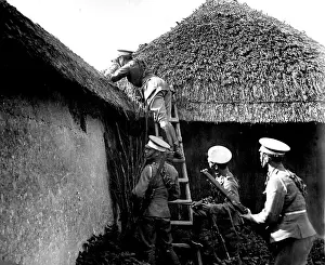 Thatch: Men of the 16th Lancers in a farmyard