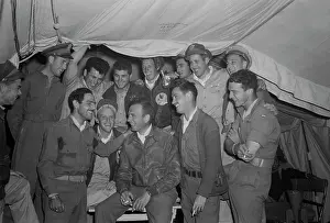 Bonding: Men of the 314th squadron telling events from