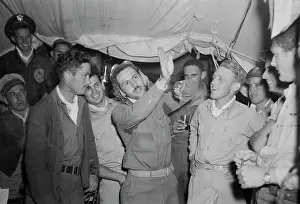 Bonding: Men of the 314th squadron telling events from