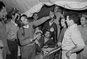 Bonding: Men of the 314th squadron telling events from