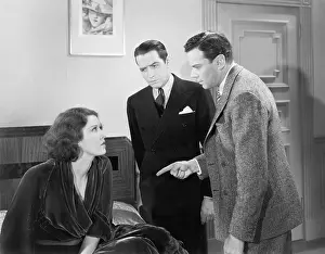 Displeasure: Men accusing a young woman