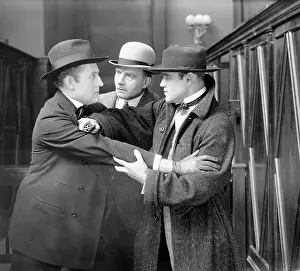 Confrontational: Three men arguing with each other