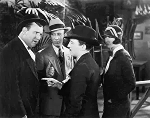 Mustaches: Three men in an argument while a woman looking on