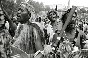 Assegais: Men, armed with traditional weapons, and some