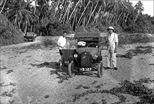 Holidaying: Men bathing with their Austin 7