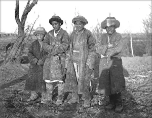 Ponsonby: Three men and a boy, Kashgar, western China