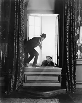 Everett Collection (old Visuals): Two men breaking into an apartment