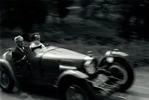 Bugatti: Two men in a Bugatti sports car