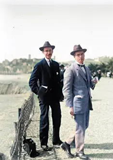 Poss: Two men on Cannes seafront