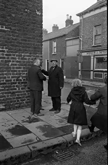 Deprivation: Two men chatting, Falls Road, Belfast, Northern Ireland