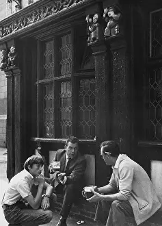 Pint: Three men chatting outside a pub