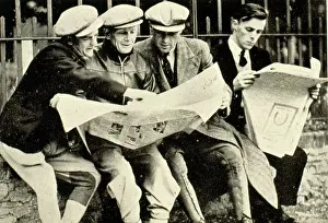 Betting: Men checking the racing form in a newspaper