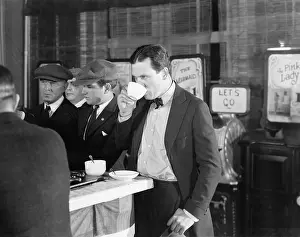 Foodstuff: Five men in a coffee house with nickelodeons