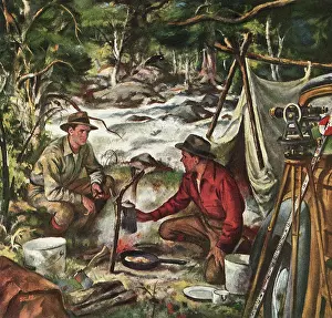 Campsite: Two Men cook at Campsite
