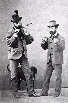 Hohenlohe: Two men in costume. Testing their sticks. About 1910