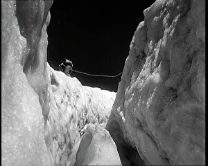 Crevice: Men Crossing Crevice In An Antarctic Ice Sheet